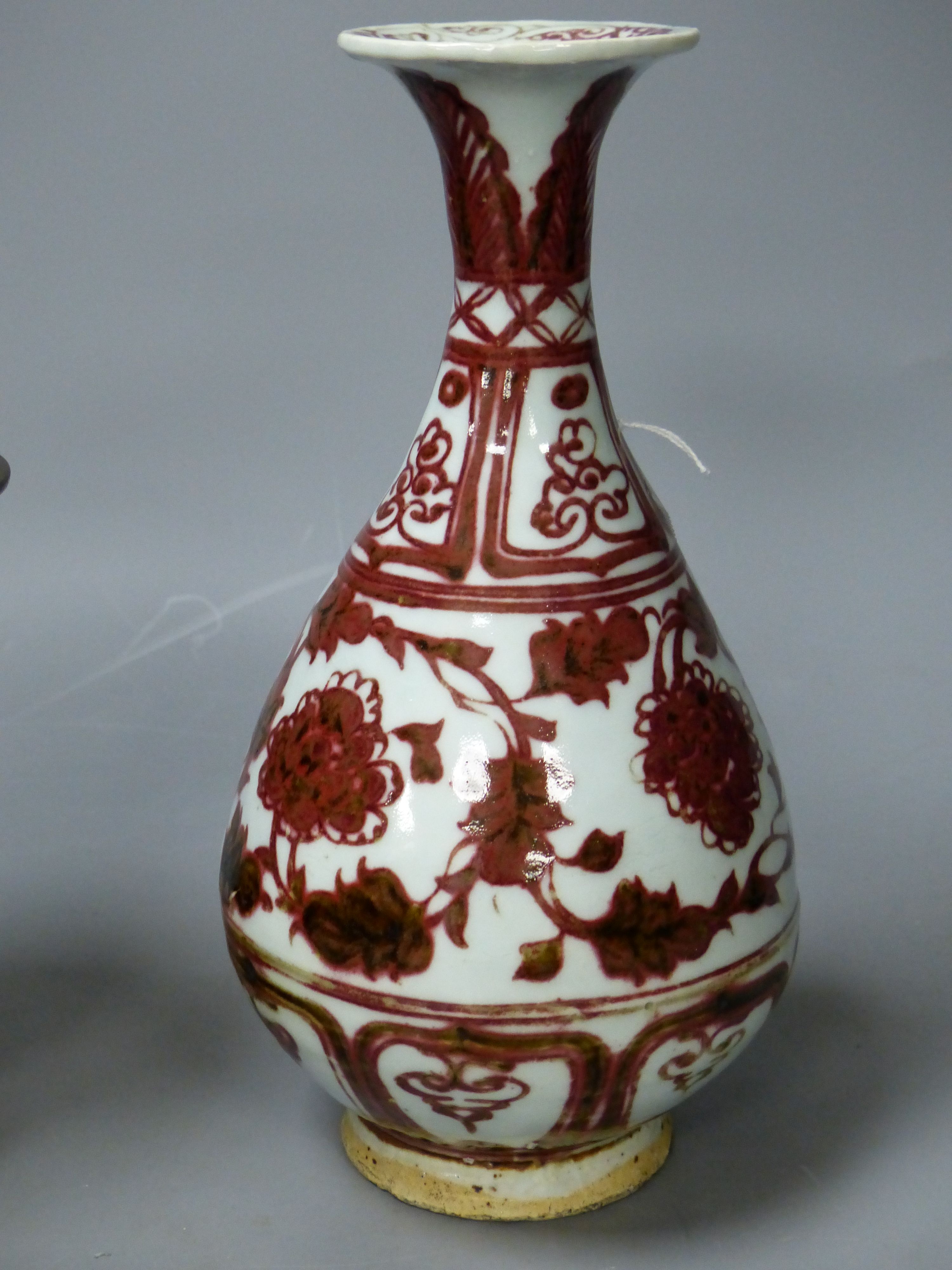 A Chinese underglaze copper red vase, an archaistic bronze vase and a hardstone brushwasher, tallest 25cm